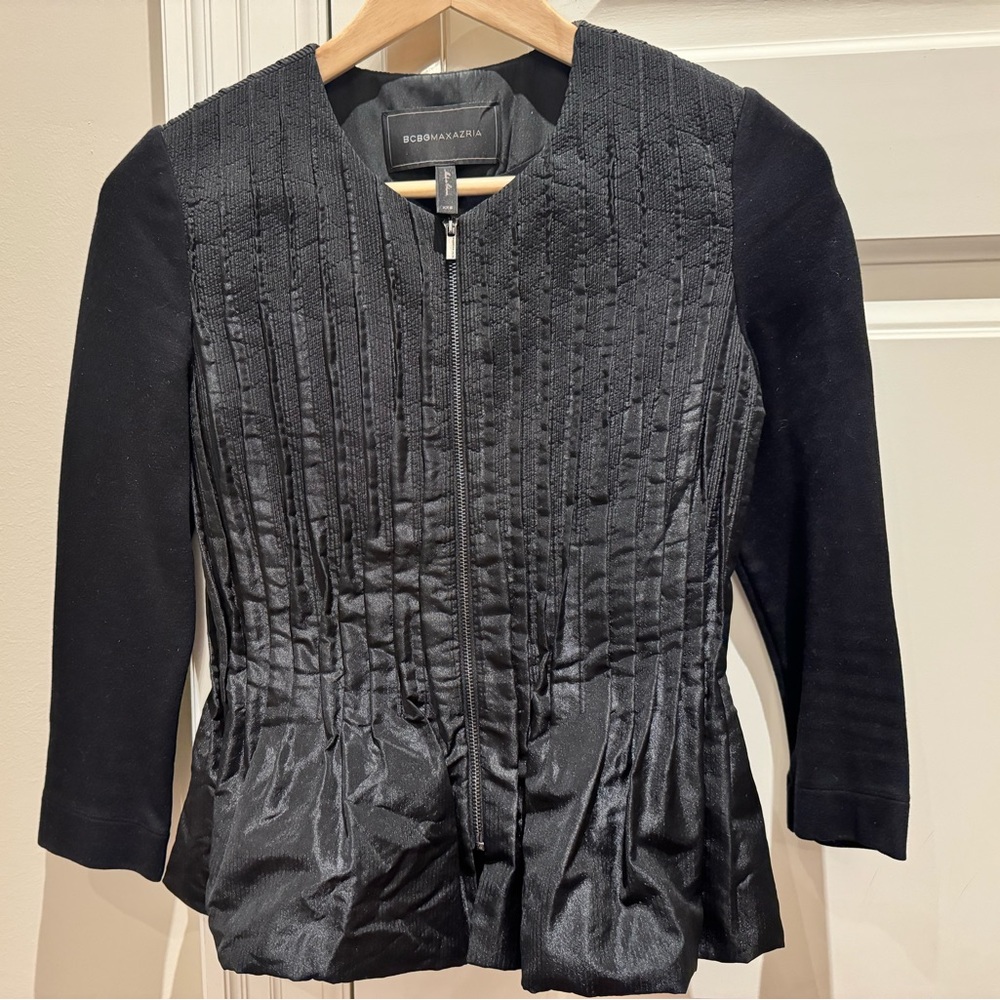 BCBG woman’s peplum blazer/sweater